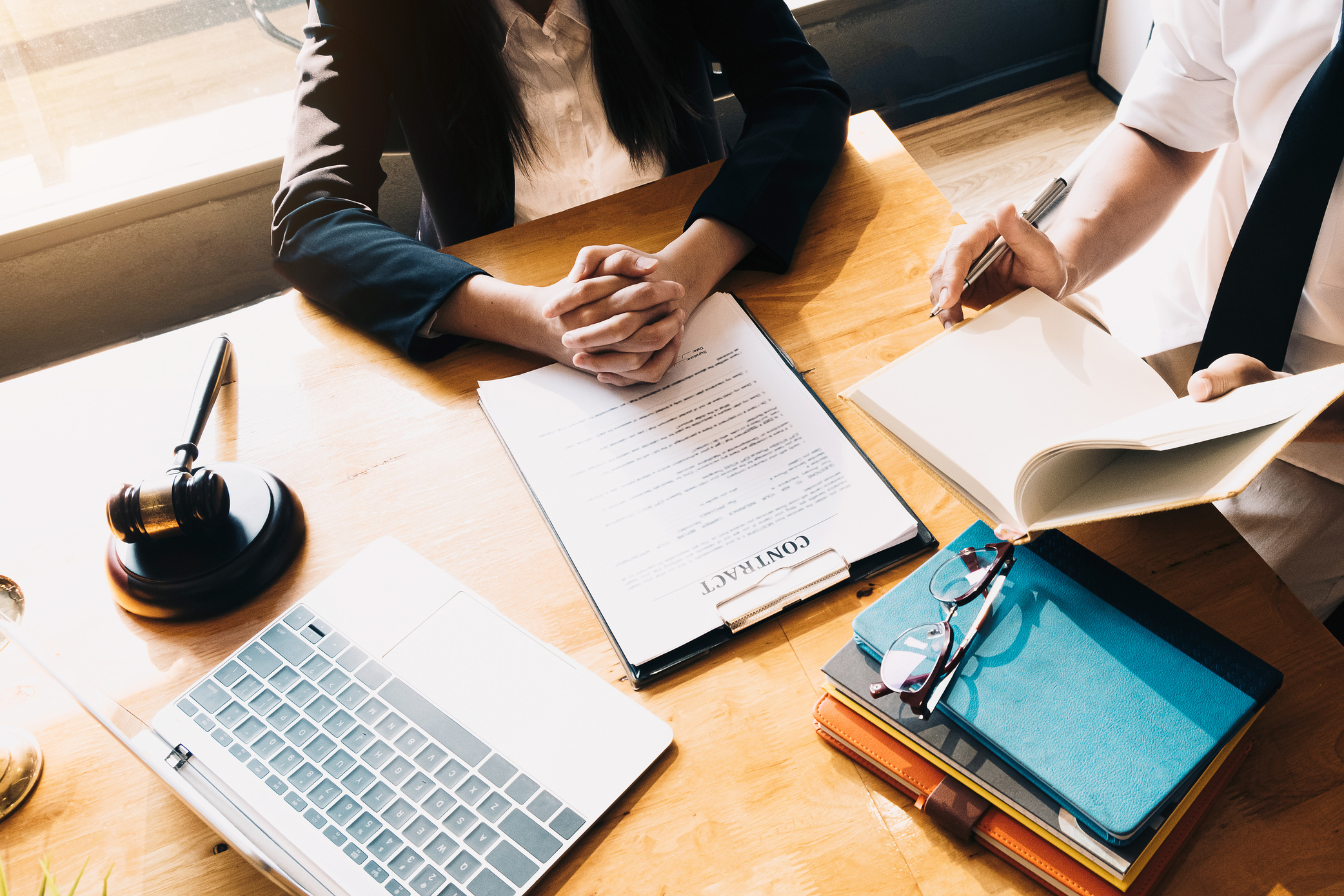 Business law concept, Lawyer business lawyers are consulting lawyers for women entrepreneurs to file a copyright lawsuit. Selective Focus
